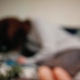 Habib Rezaei, A blurry Photo of a female personage on a sofa